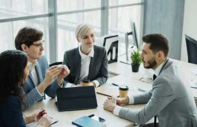 Colleagues discussing a business project