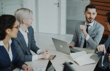 Business professionals reviewing information together
